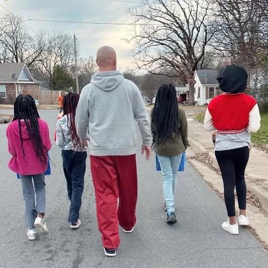 Tommy walks with kids