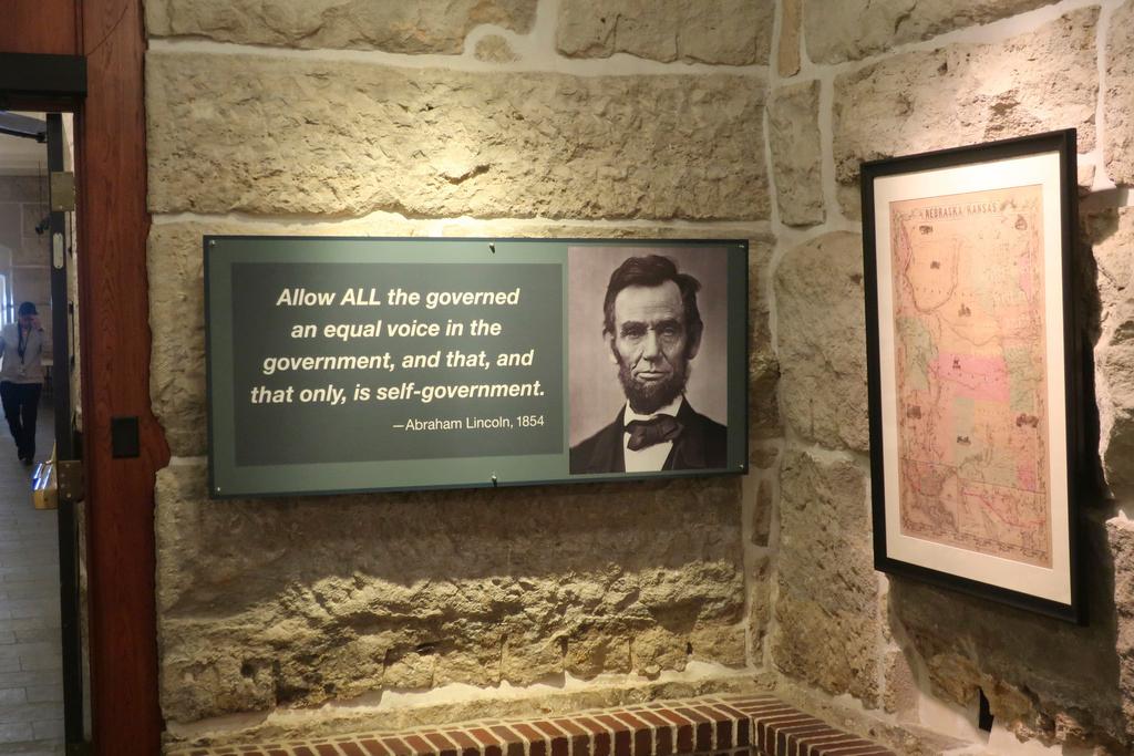 Historical exhibit at the Kansas Statehouse includes a display quoting President Abraham Lincoln