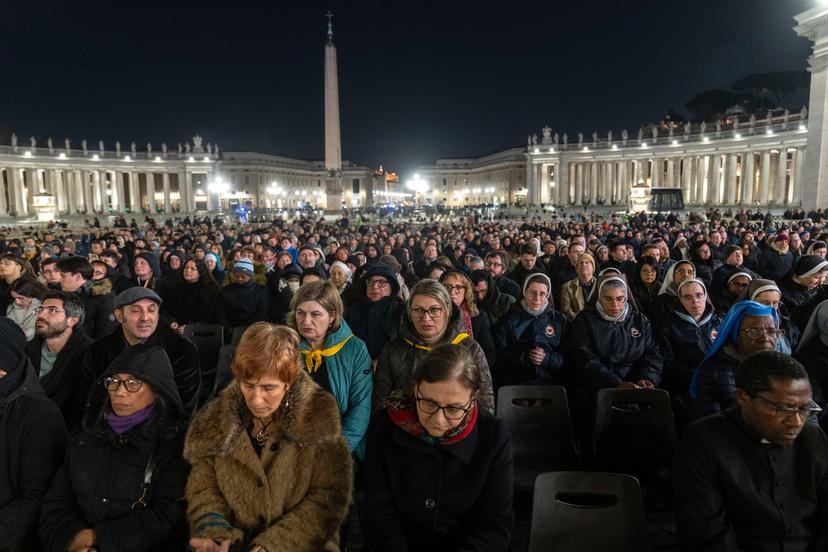 Catholic faithful attend a nightly rosary prayer for the health of Pope Francis in St. Peter's Square 