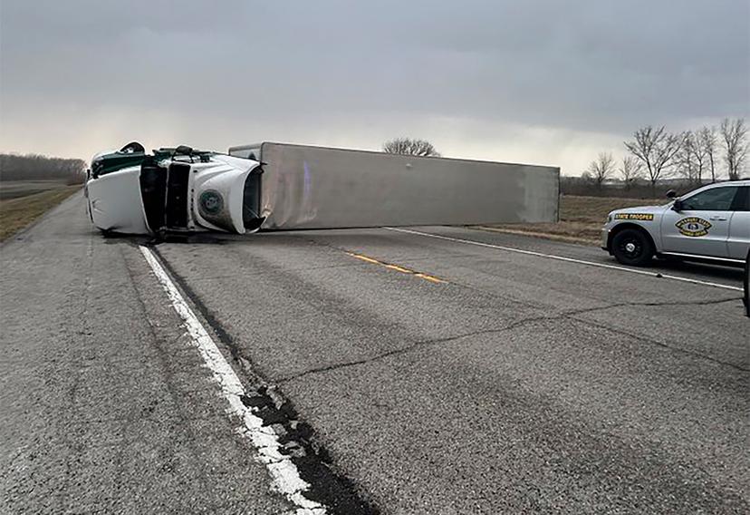 Tractor-trailer overturned by high winds on highway MO-210 in Ray County, Missouri