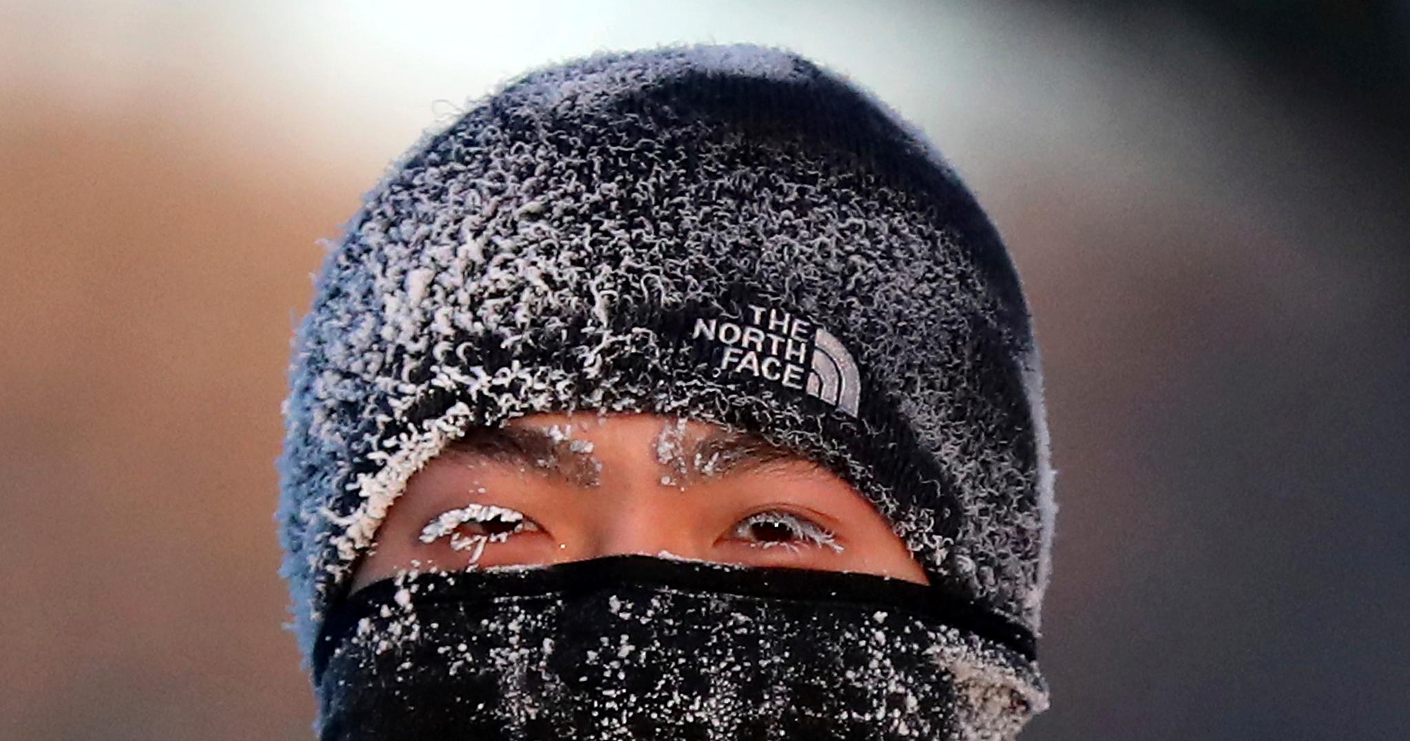 person with snow on face