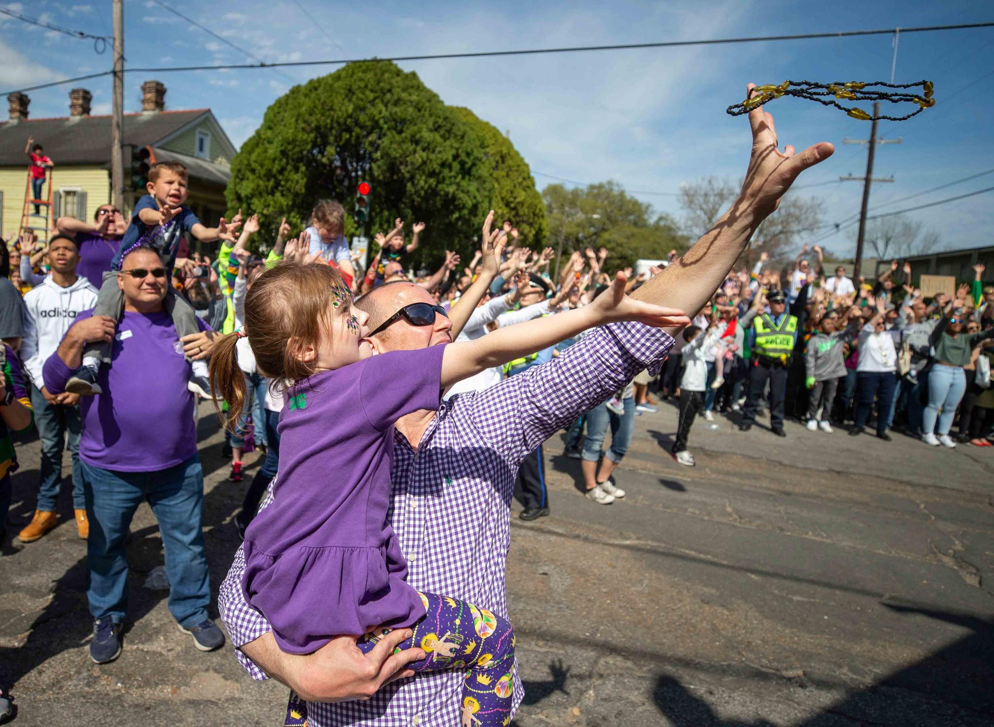 The 73rd annual Krewe of Thoth parade with the theme, As The World Turns, rolls along Henry Clay Avenue Sunday, Feb. 23, 2020, in New Orleans.