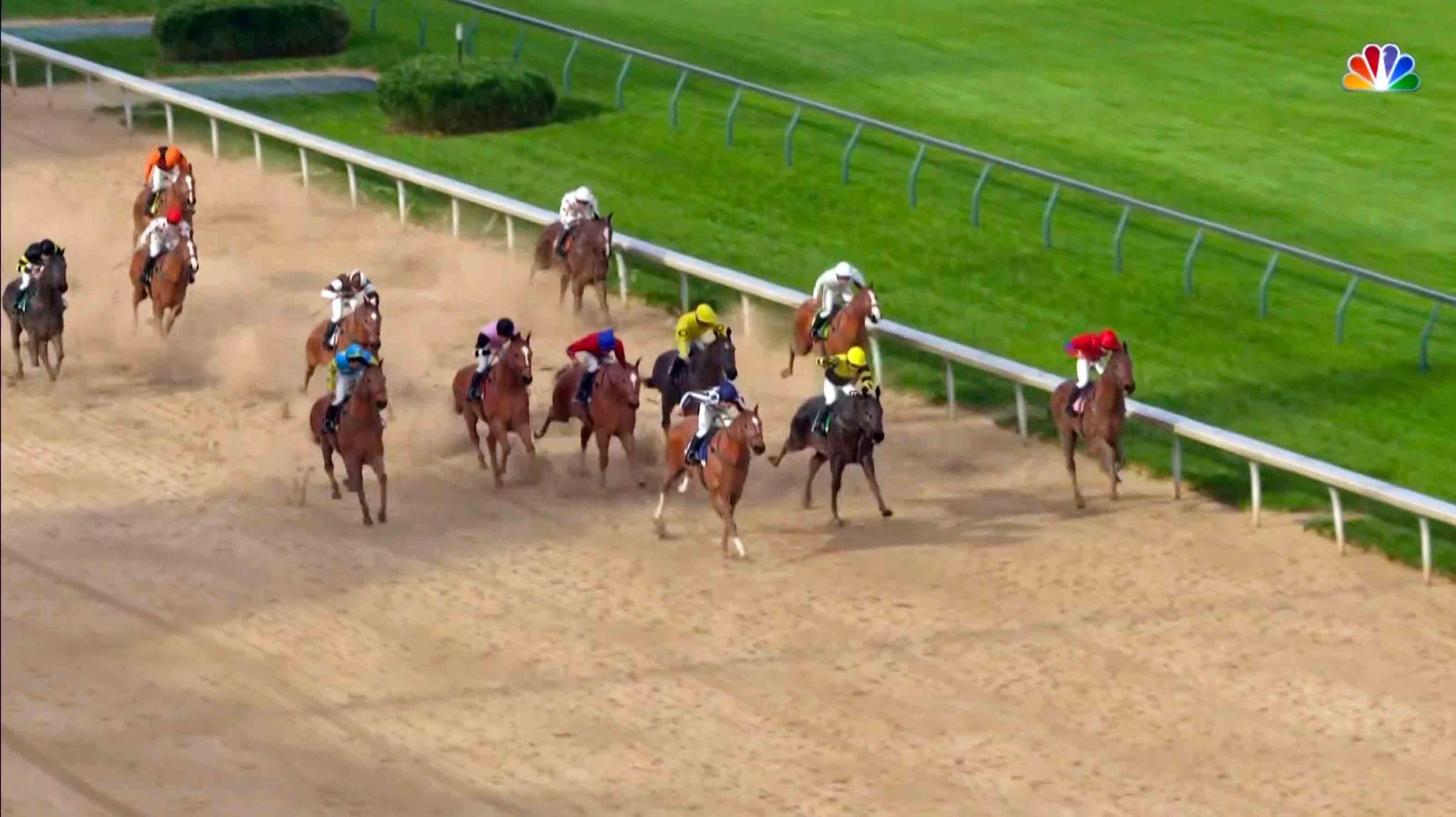 In this image taken from video provided by NBC Sports, Secretariat, front center, leads the field down the stretch win a computer-simulated version of the Kentucky Derby horse race between the 13 winners of the Triple Crown, Saturday, May 2, 2020, in Louisville