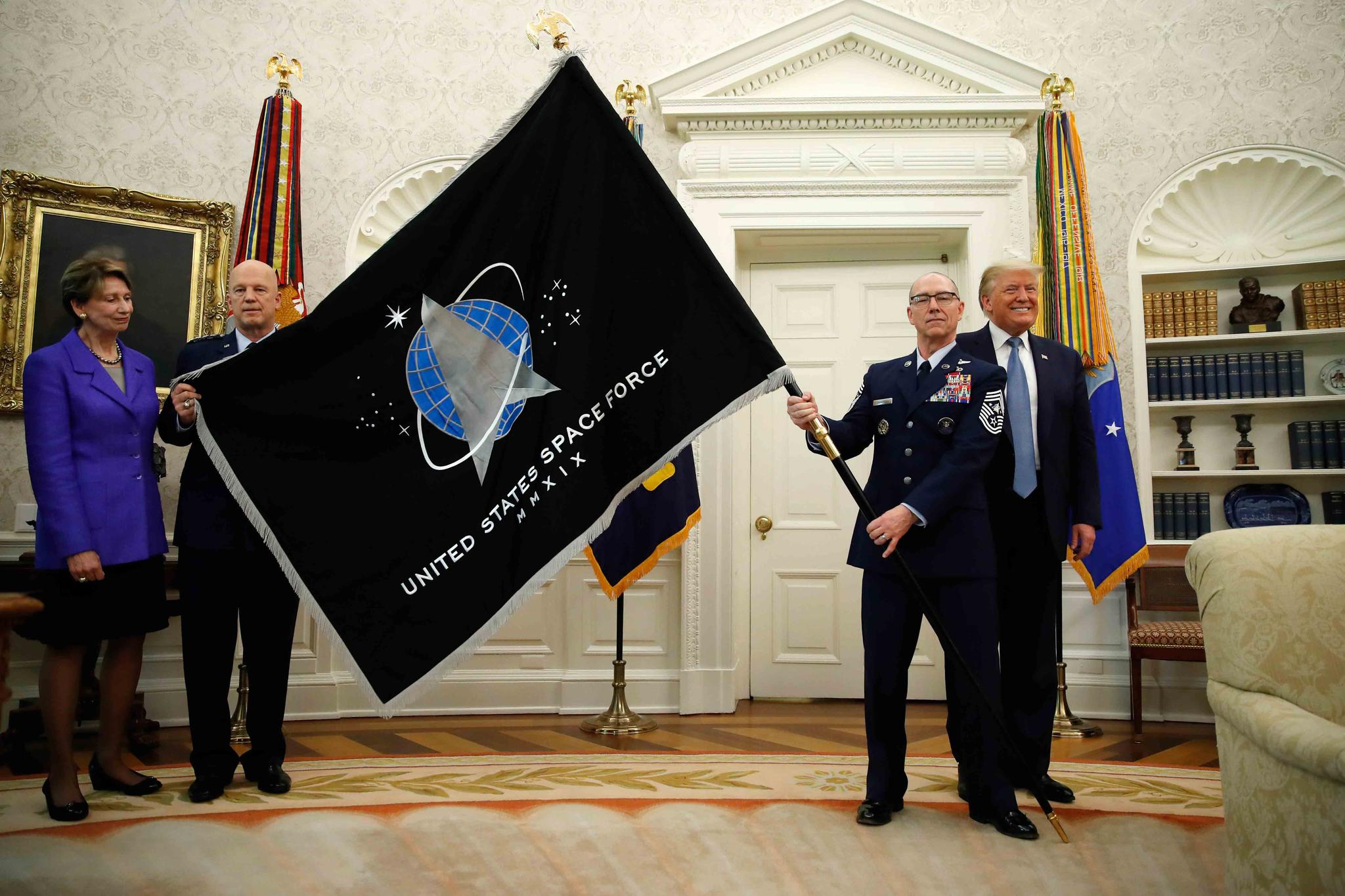 Space Force Flag being presented in Oval Office of White House