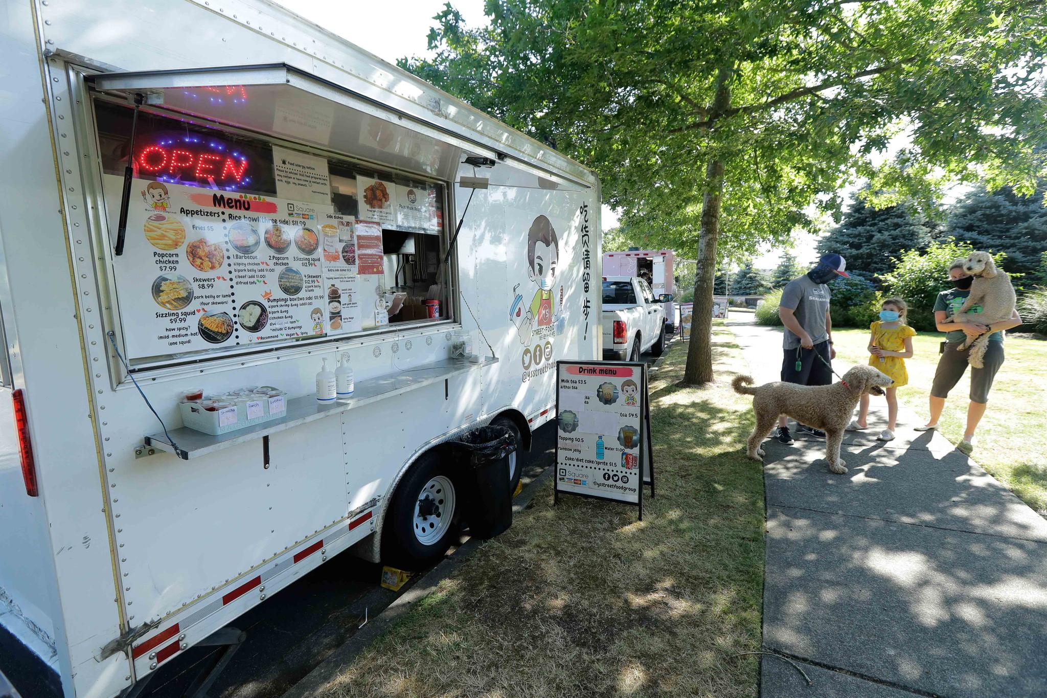 Family awaiting Food truck order