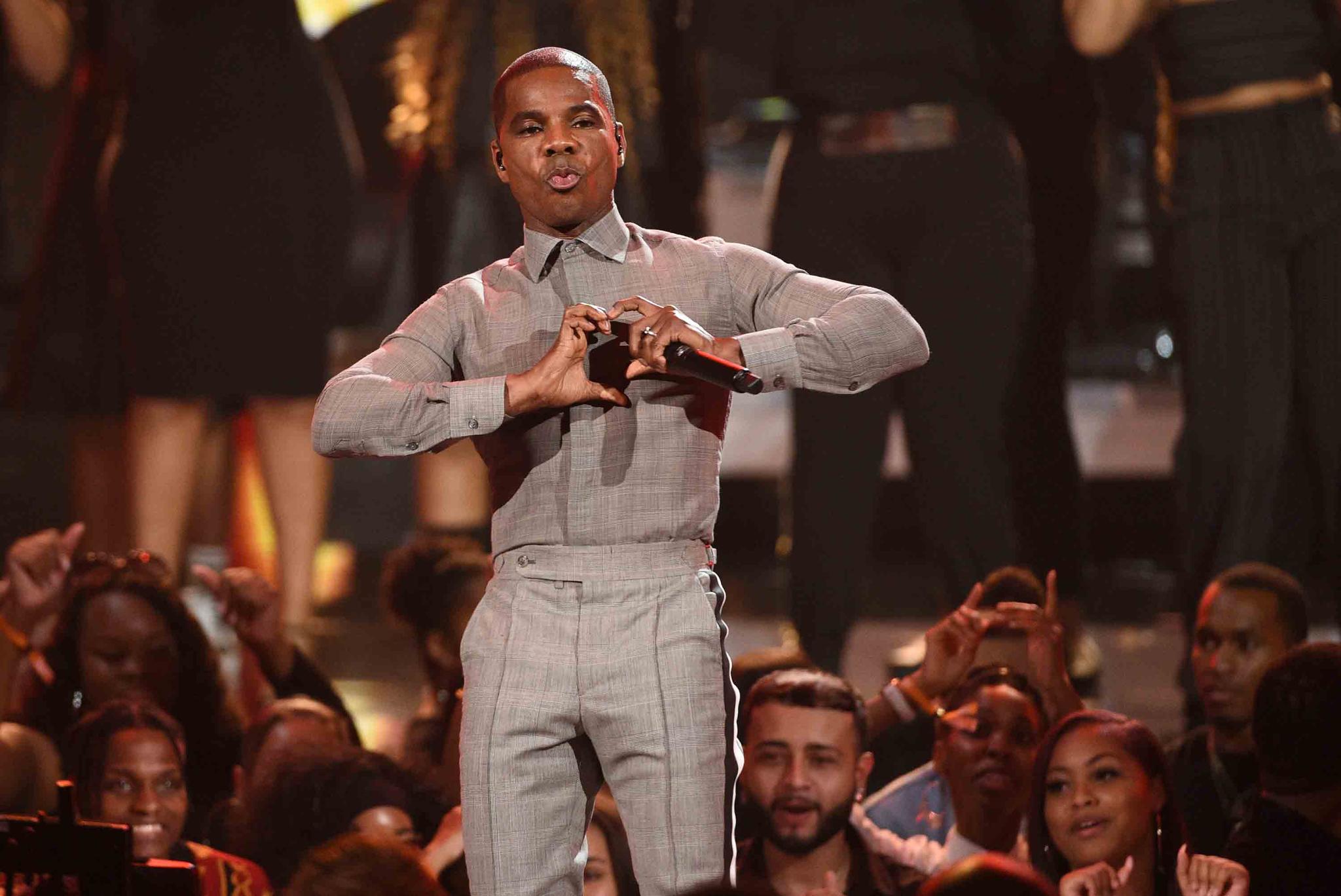 Kirk Franklin gestures as he performs at the BET Awards in Los Angeles.