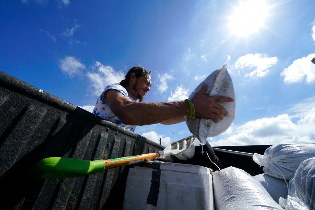 Filling sandbags ahead of Hurricane Delta 