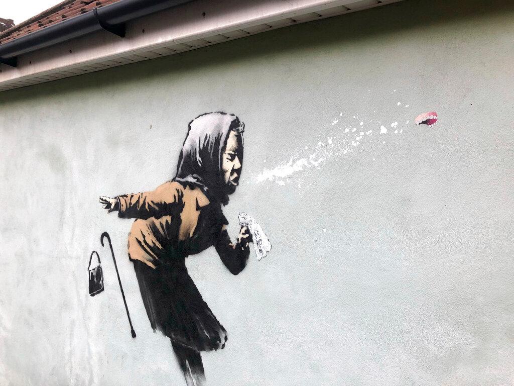 Banksy's latest mural titled “Aachoo!!” that has appeared on a wall in Bristol, England