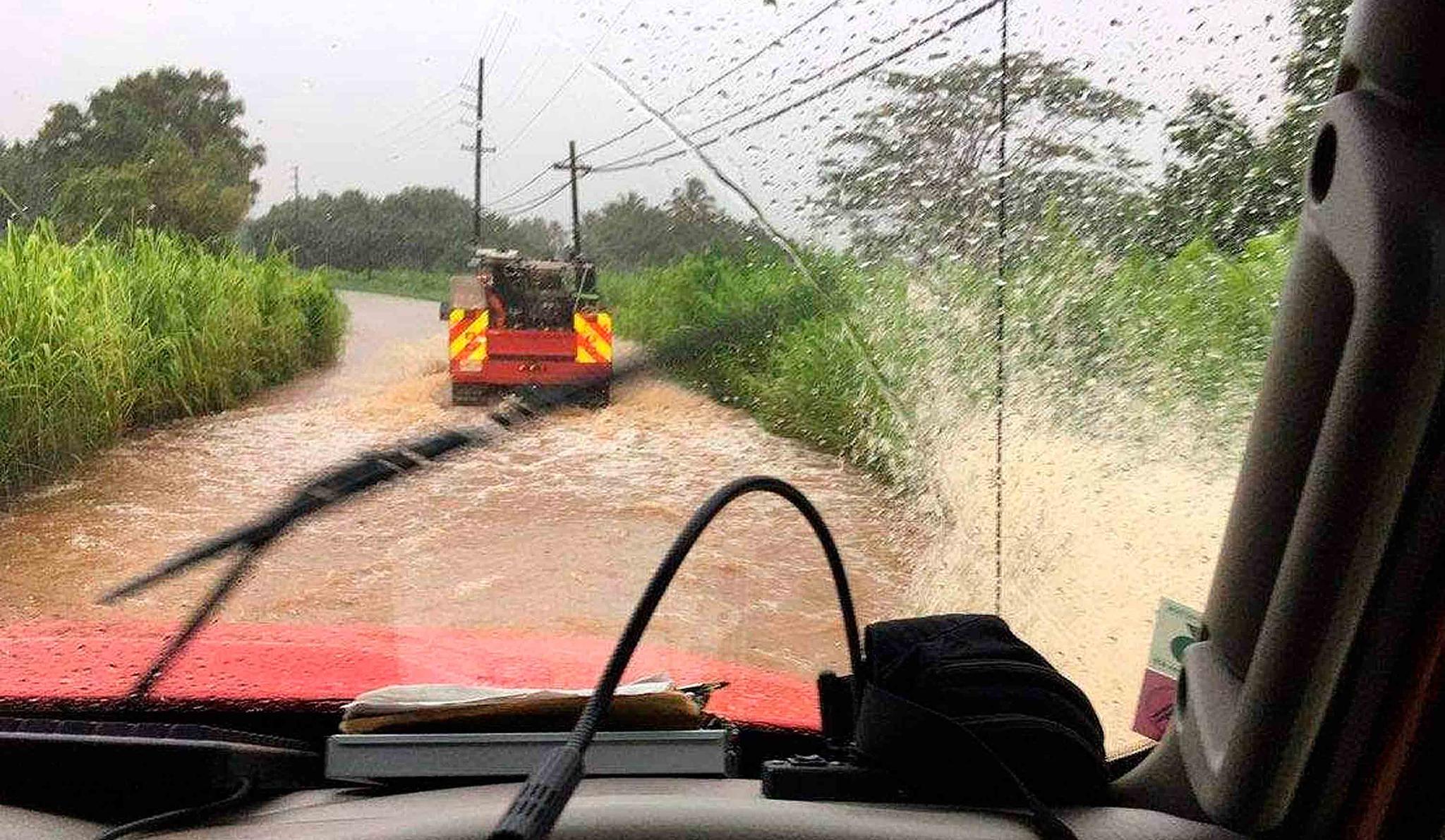 This Monday, Aug. 27, 2018 photo provided by the County of Kauai shows flooding on Kuhio Highway near the town of Hanalei on the island of Kauai in Hawaii.