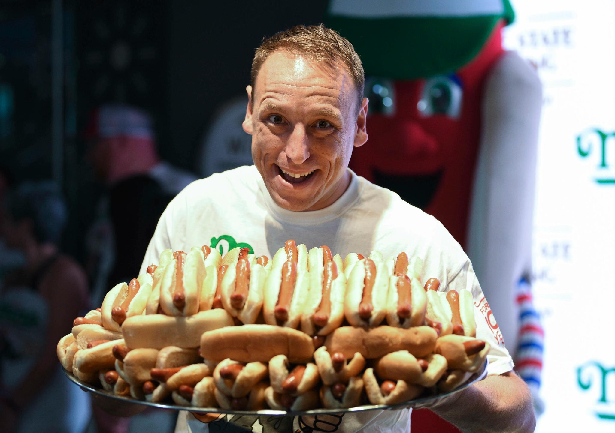 Joey Chestnut with hot dogs