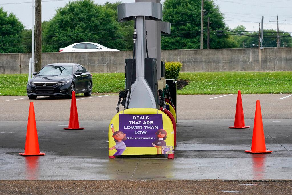 Safety cones block access to the fuel pumps at this closed Kroger fuel station in Jackson, Miss.