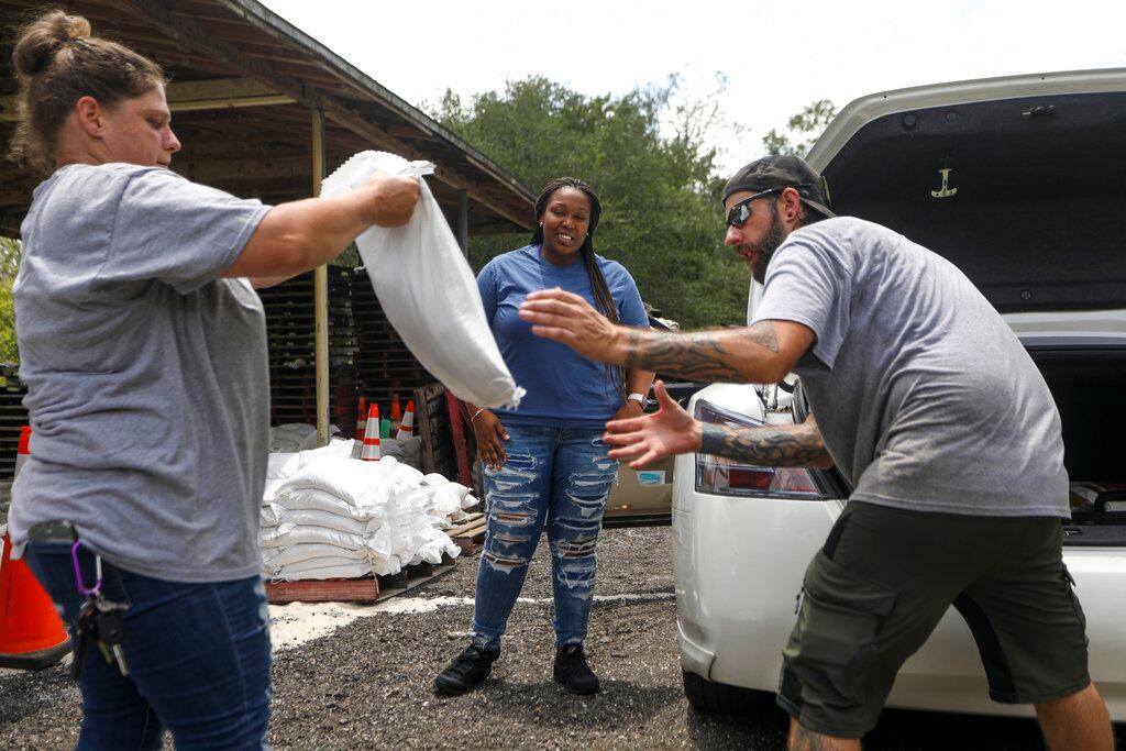 Loading Sandbags in Car 