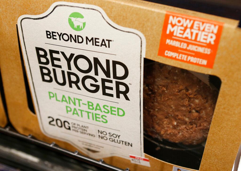 In this June 27, 2019, file photo a meatless burger patty called Beyond Burger made by Beyond Meat is displayed at a grocery store in Richmond, Va. Plant-based meat maker Beyond Meat said Thursday, Aug. 5, 2021 that its revenue jumped 32% in the second quarter as demand from restaurants returned.