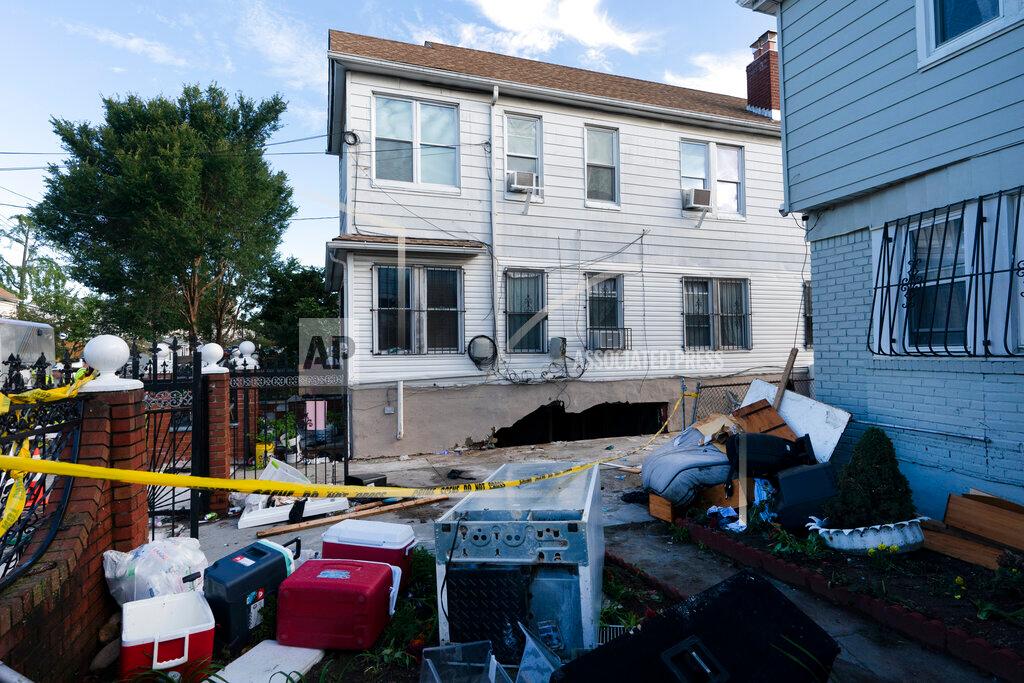 Damage to the side of a building from the remnants of Hurricane Ida is shown on Thursday, Sept. 2, 2021 in the Queens borough of New York