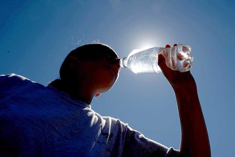 Man Drinking Water