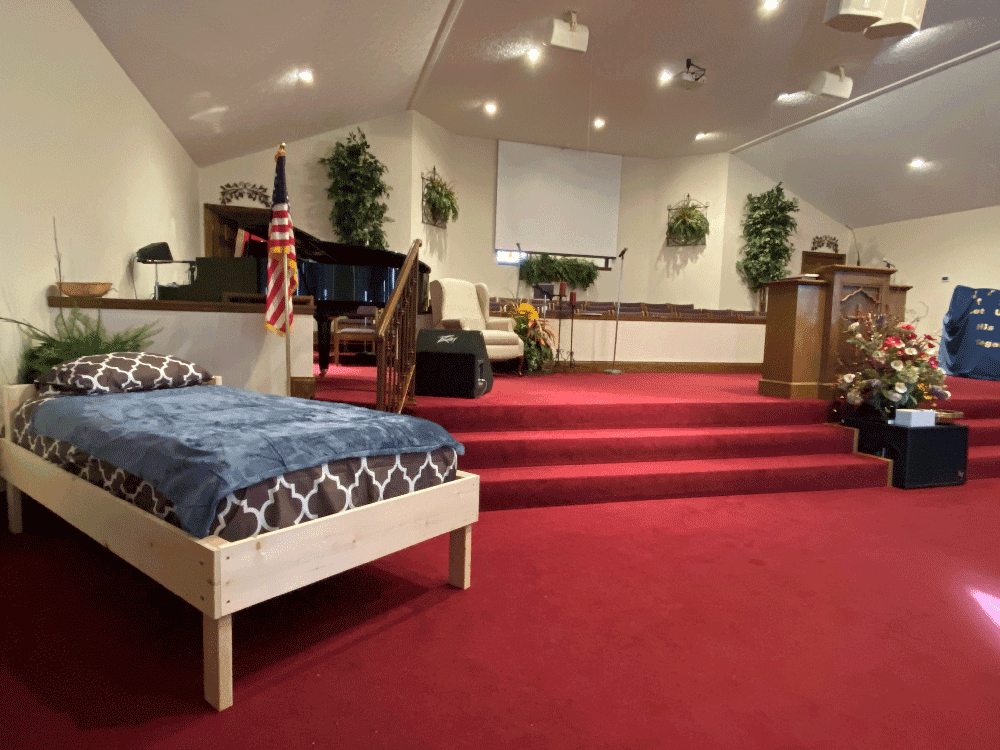 Edmonton Worship Center: A church-made bed, a visual reminder of the wonderful outreach taking place to help families. 