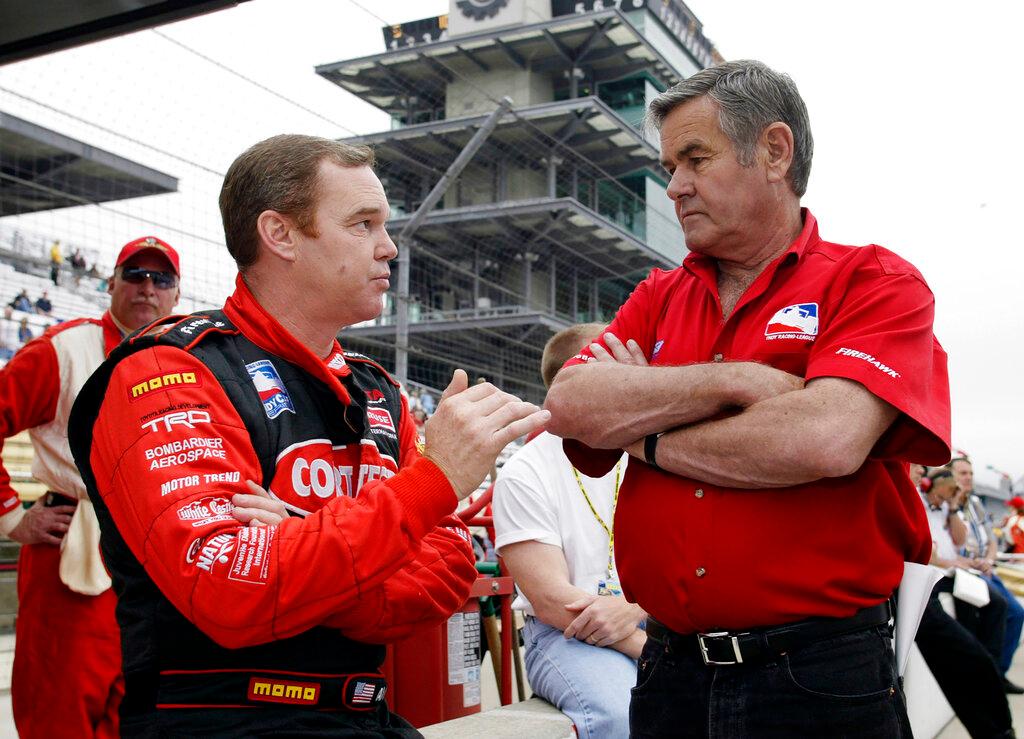 Al Unser Sr. talks to son Al Unser Jr. at Indianapolis Motor Speedway 