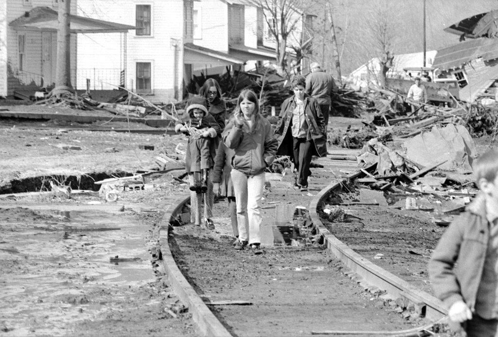 Children walk down track in Buffalo Creek, West Virginia after catastrophic flood in 1972 