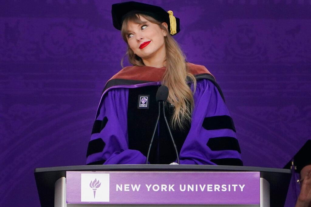 Taylor Swift speaks during a graduation ceremony for New York University at Yankee Stadium