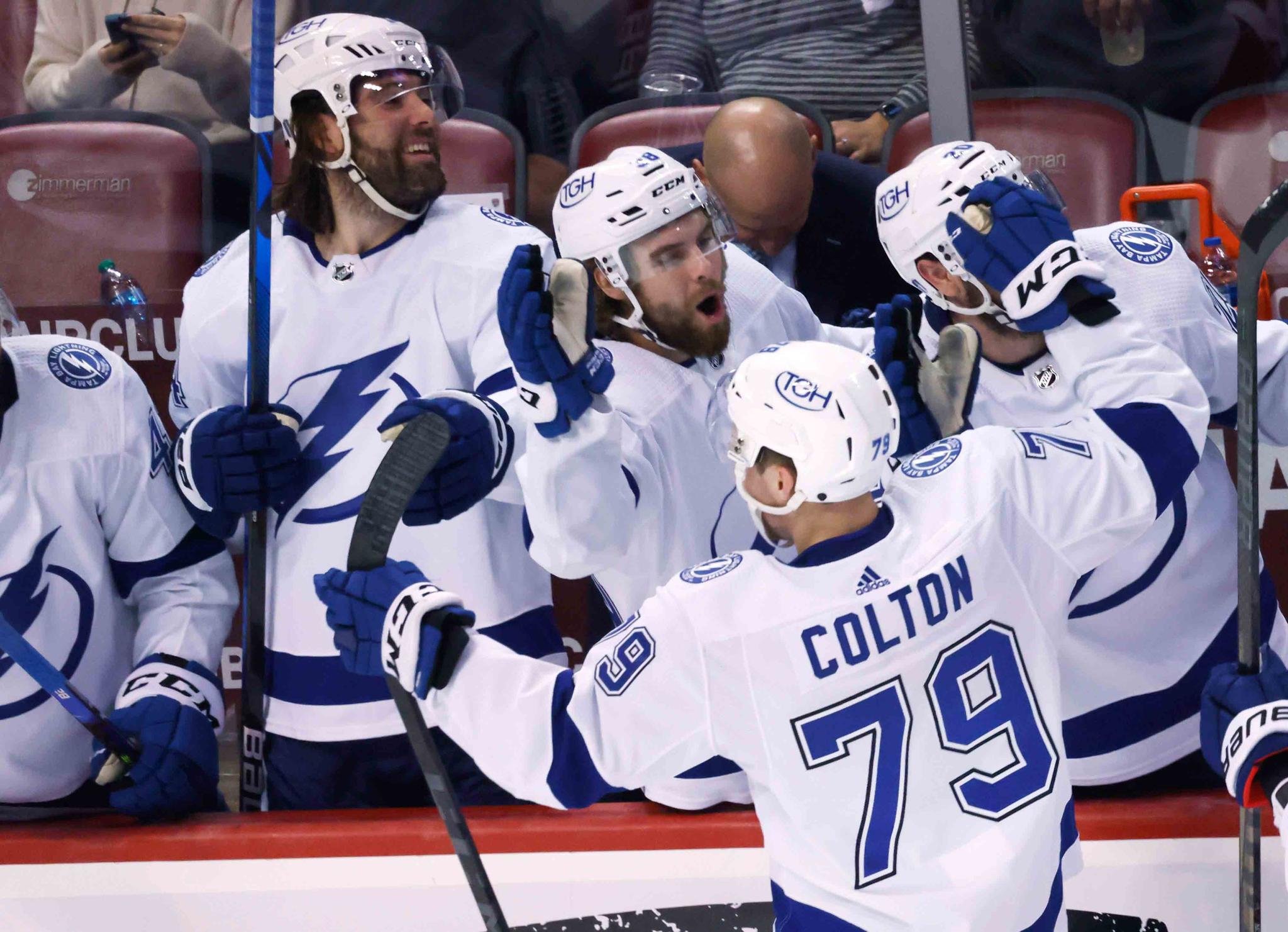 Tampa Bay Lightning center Ross Colton (79) is congratulated after scoring agains the Florida Panthers in the closing seconds of Game 2 of an NHL hockey second-round playoff series Thursday, May 19, 2022, in Sunrise, Fla.