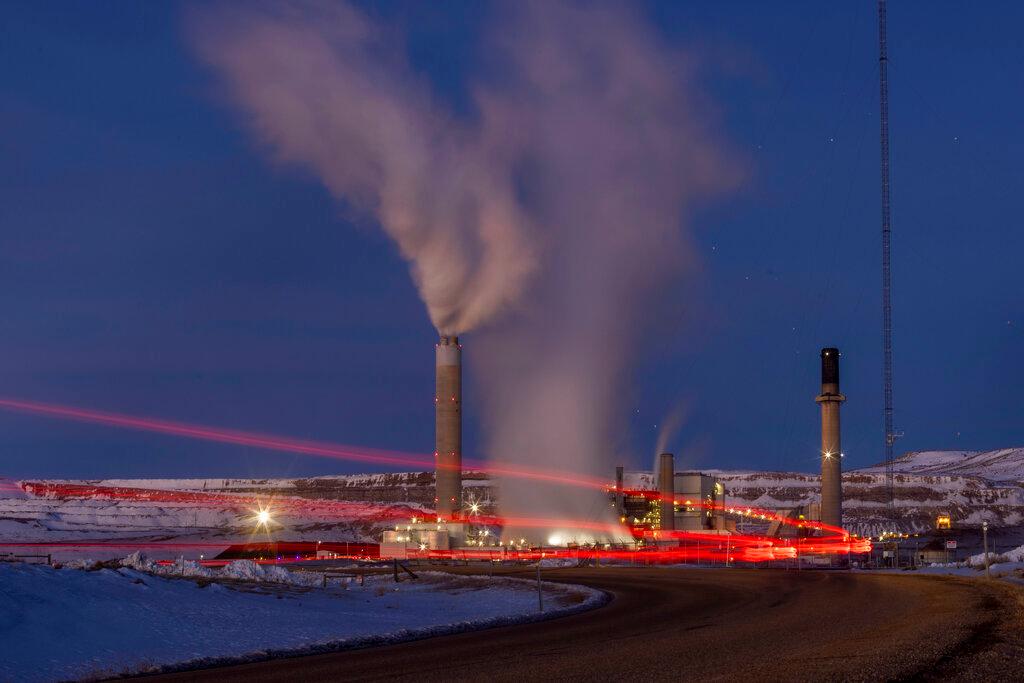 Taillights trace the path of a motor vehicle at the Naughton Power Plant in Kemmerer, Wyo. 