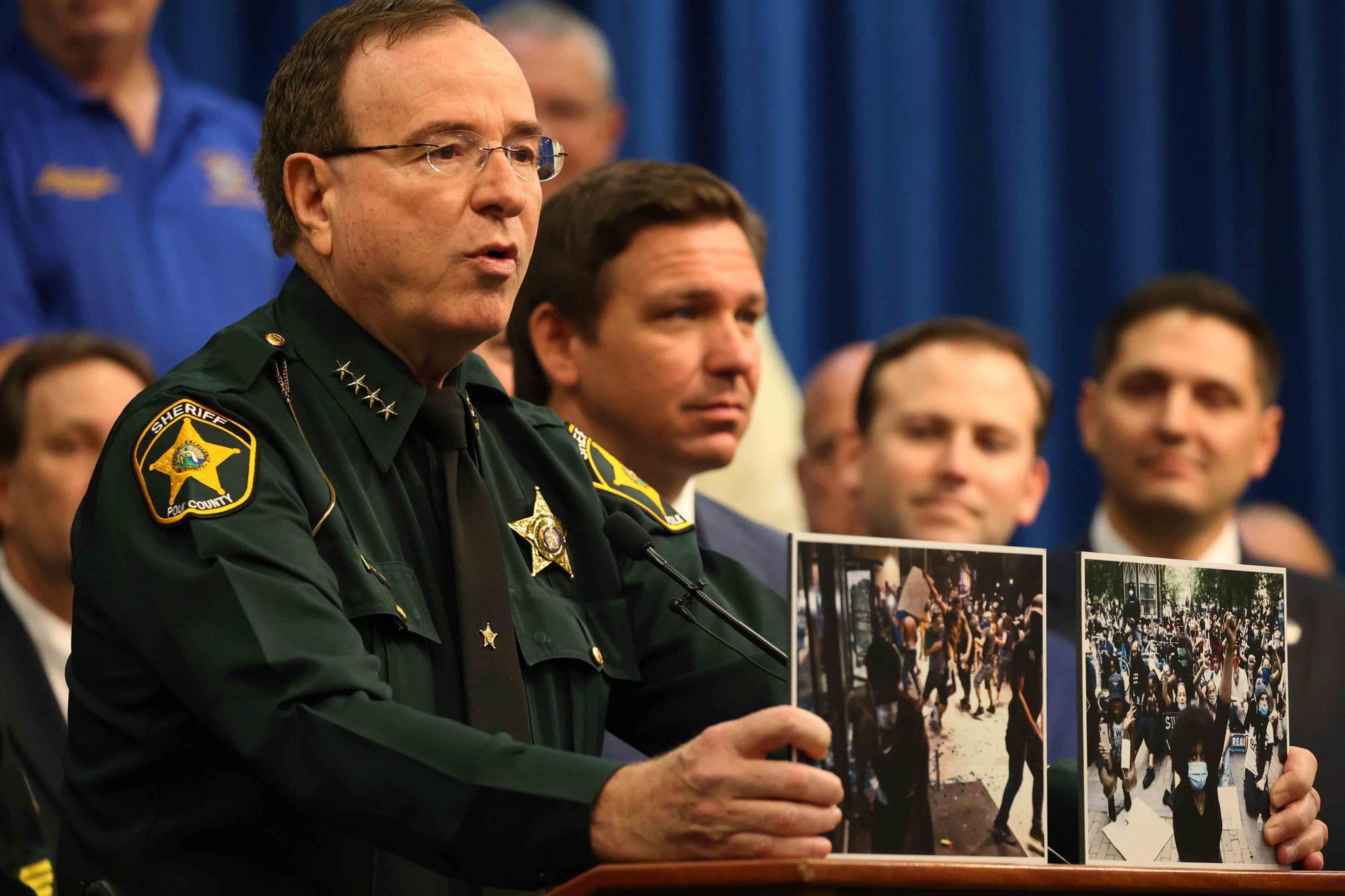 Polk County Sheriff Grady Judd speaks during a press conference with Gov. Ron DeSantis at the Polk County Sheriff's Office in Winter Haven, Fla., on, April 19, 2021.