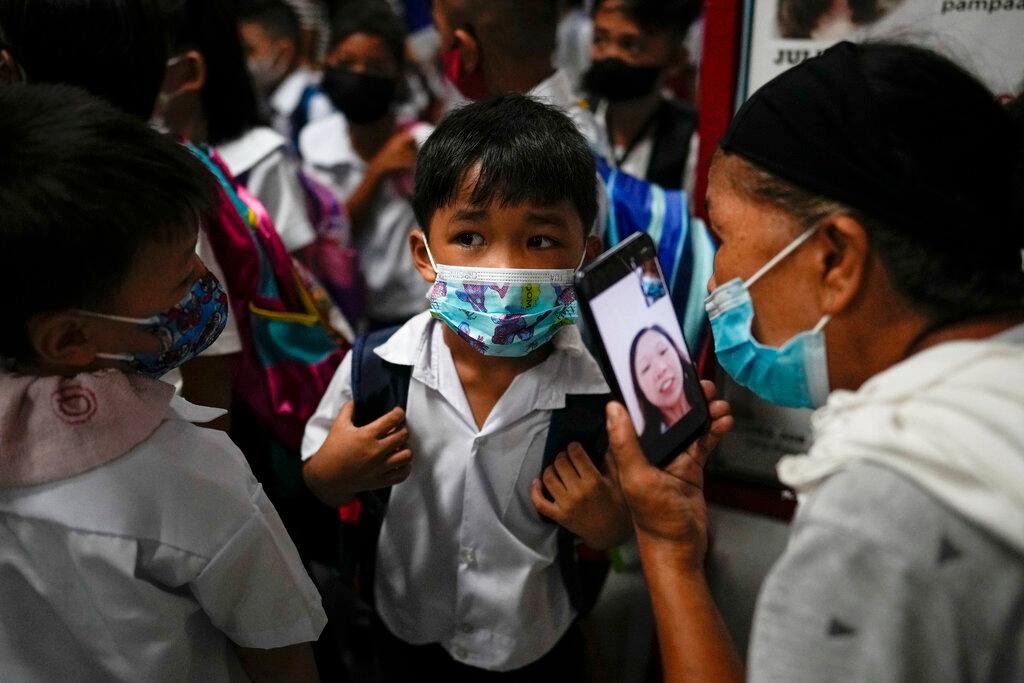 Young boy wearing mask back to school