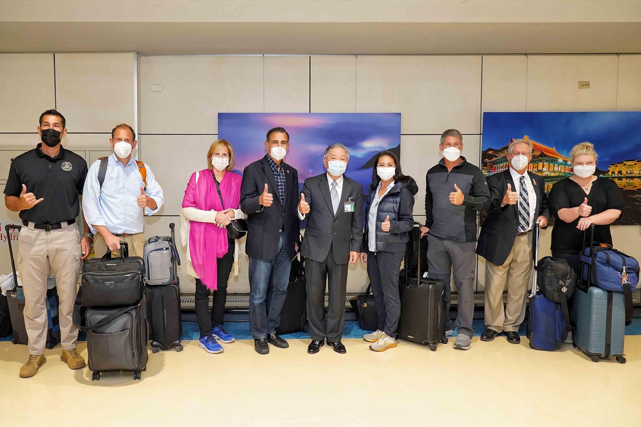 In this photo released by the Taiwan Ministry of Foreign Affairs, United States congressional delegation pose for photos after arriving at Taoyuan airport near Taipei, Taiwan Wednesday, Sep. 7, 2022.