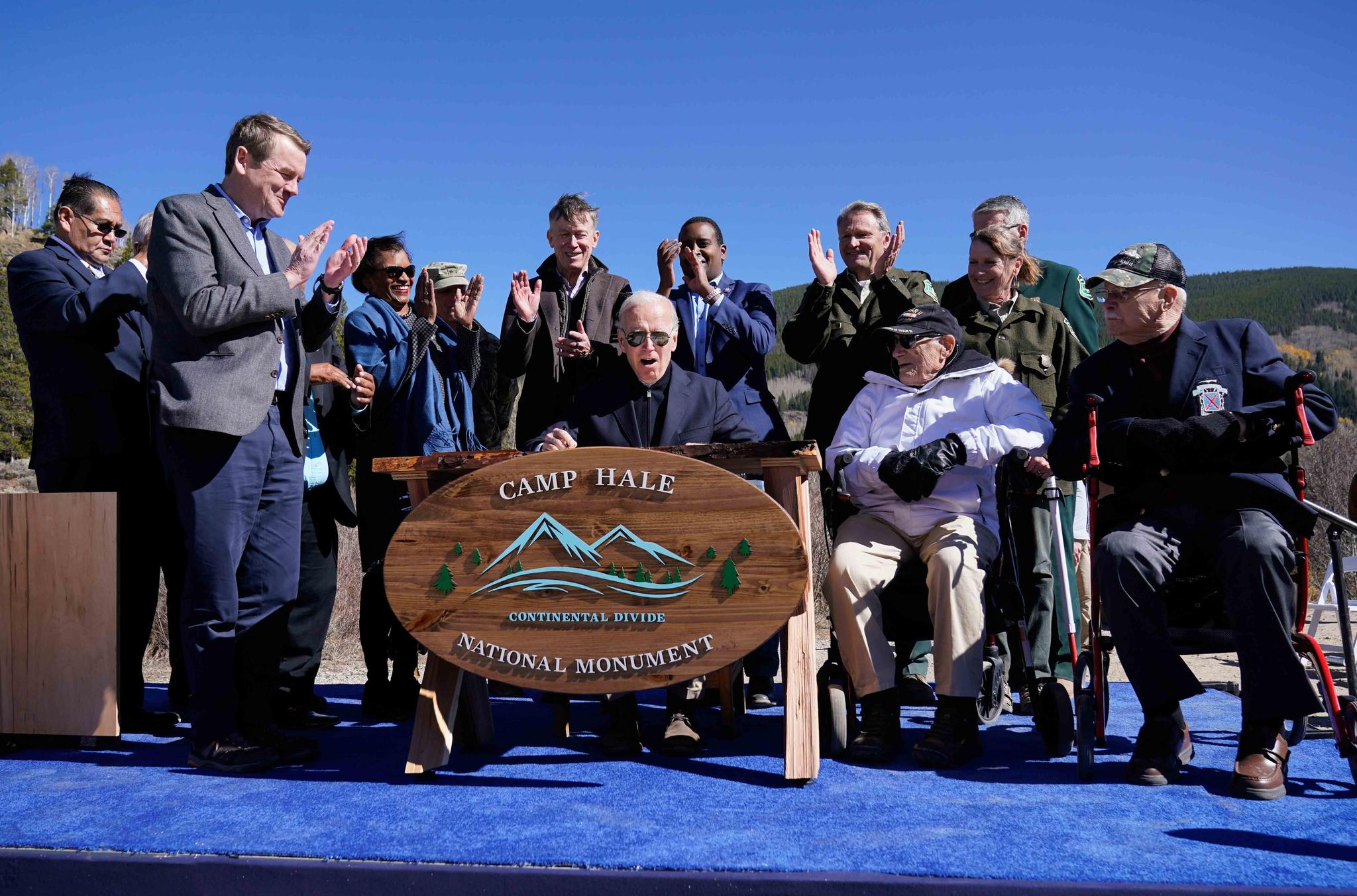 President Joe Biden reacts after signing a proclamation to designate the first national monument of his administration at Camp Hale, a World War II-era training site, near Leadville, Colo., Wednesday, Oct. 12, 2022.