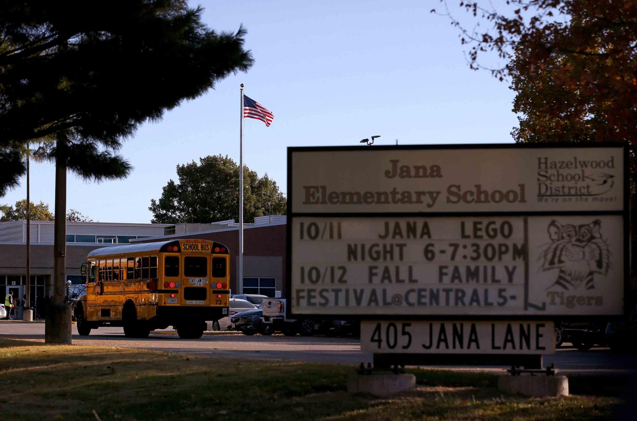 A school bus arrives at Jana Elementary School on Monday, Oct. 17, 2022 in Florissant, Mo.