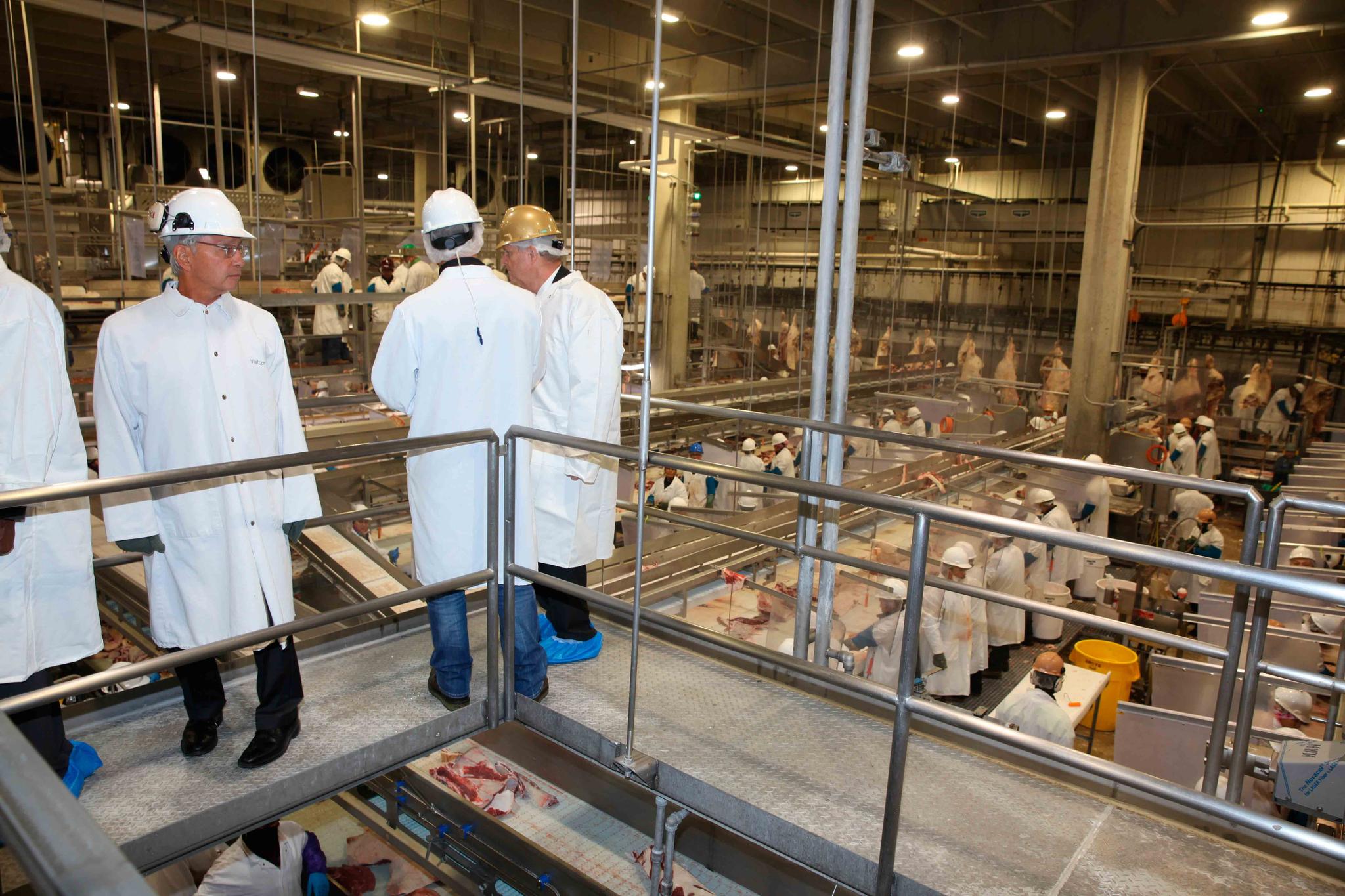 Officials tour the Greater Omaha Packing beef processing plant in Omaha, Neb., on Wednesday, Nov. 2, 2022. Greater Omaha is receiving a $20 million grant to expand its operations as part of a larger USDA program to expand meat processing capacity and encourage more competition in the highly concentrated business.