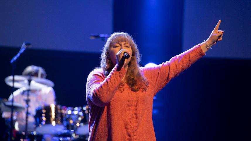 Bethany Norris singing in chapel at Cedarville University