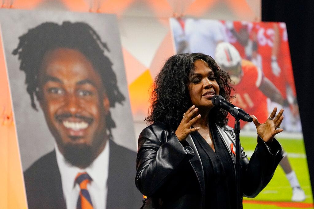 Gospel singer CeCe Winans sings during a memorial service for three slain University of Virginia football players 