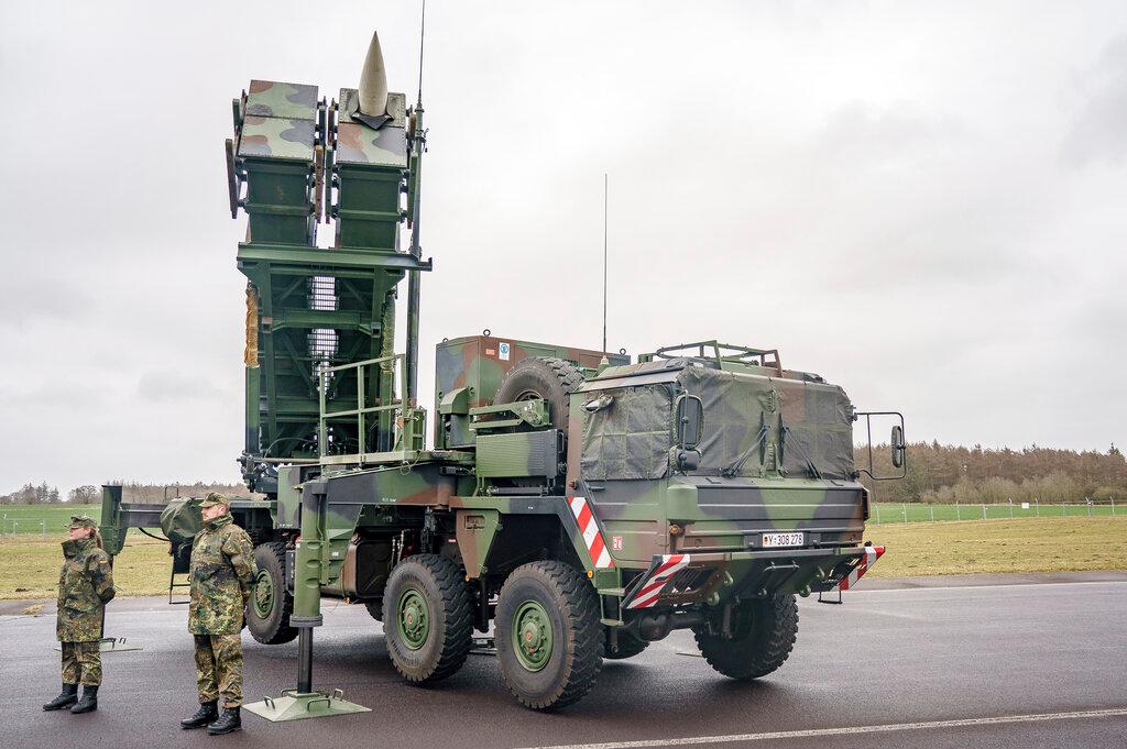 Ready-for-combat "Patriot" anti-aircraft missile systems of the German forces Bundeswehr's anti-aircraft missile squadron 1 stand on the airfield of military airport during a media presentation.