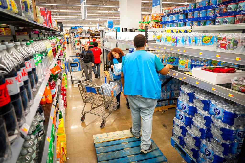 People shop for bottled water after a boil water notice was issued for the entire city of Houston