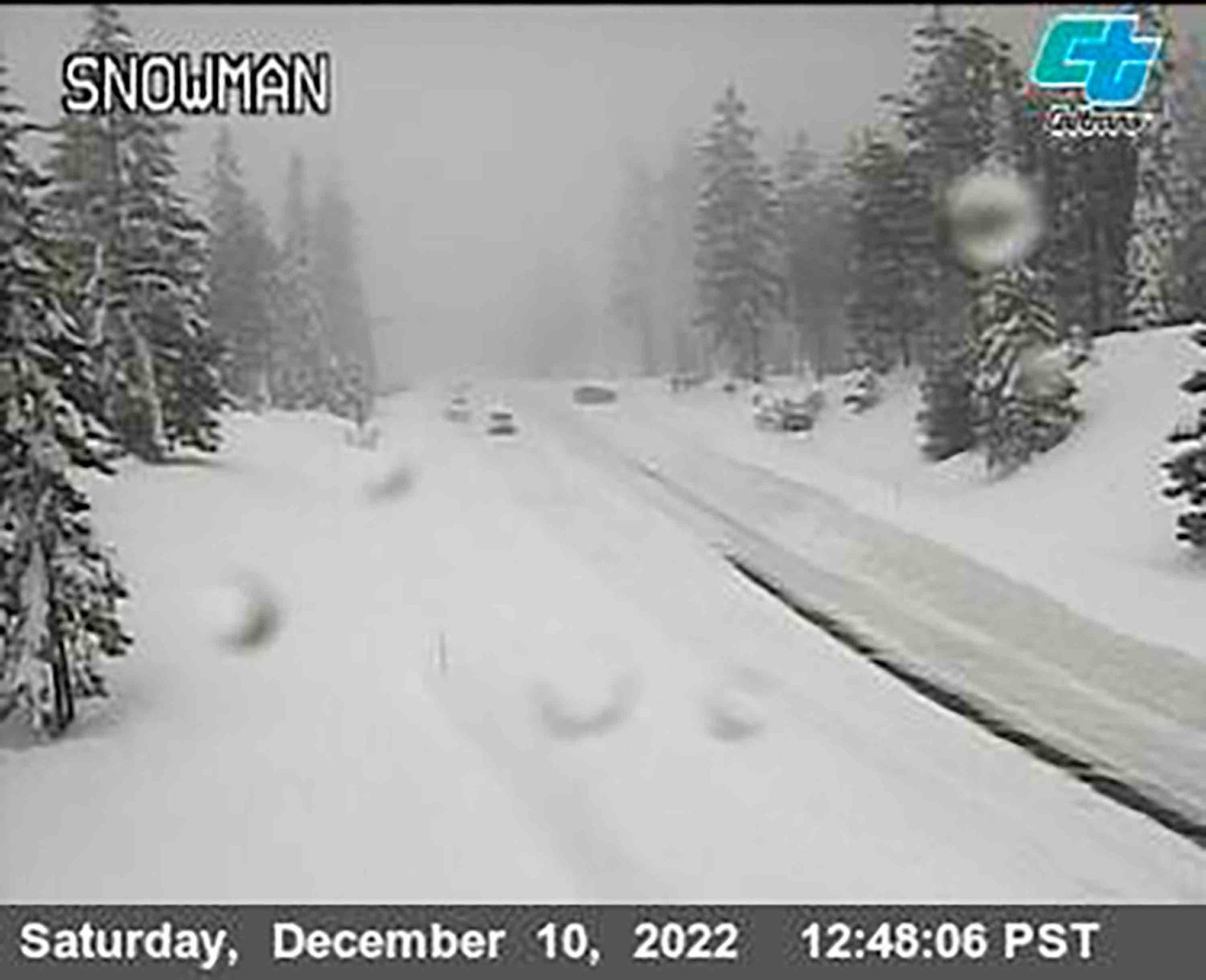 This image from a Caltrans traffic camera shows snow conditions on California SR-89 Snowman in Shasta-Trinity National Forest, Calif., Saturday, Dec. 10, 2022. 