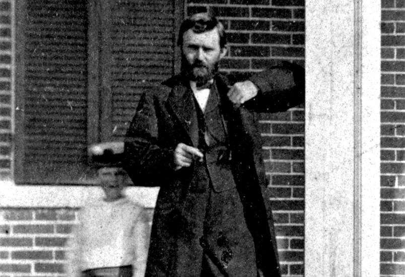 Ulysses S. Grant and his son, believed to be his youngest, Jesse Root Grant on the porch of his home in Galena, Illinois, was taken around 1865. The house was presented to him August 19,1865, upon his return to Galena after the Civil War