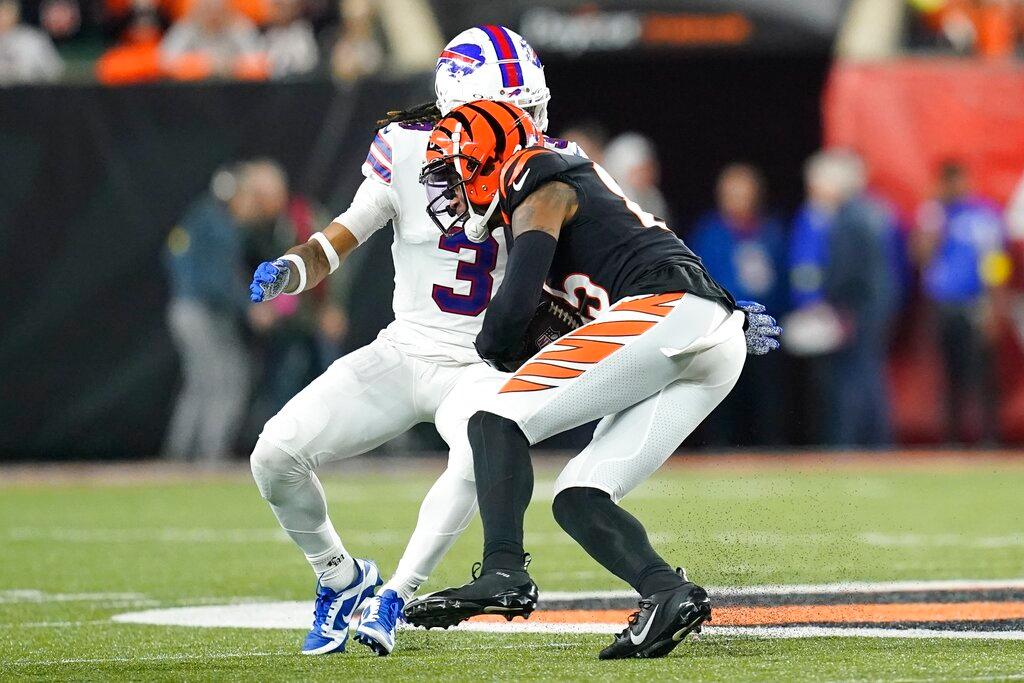 Cincinnati Bengals wide receiver Tee Higgins (85) runs near Buffalo Bills safety Damar Hamlin (3)