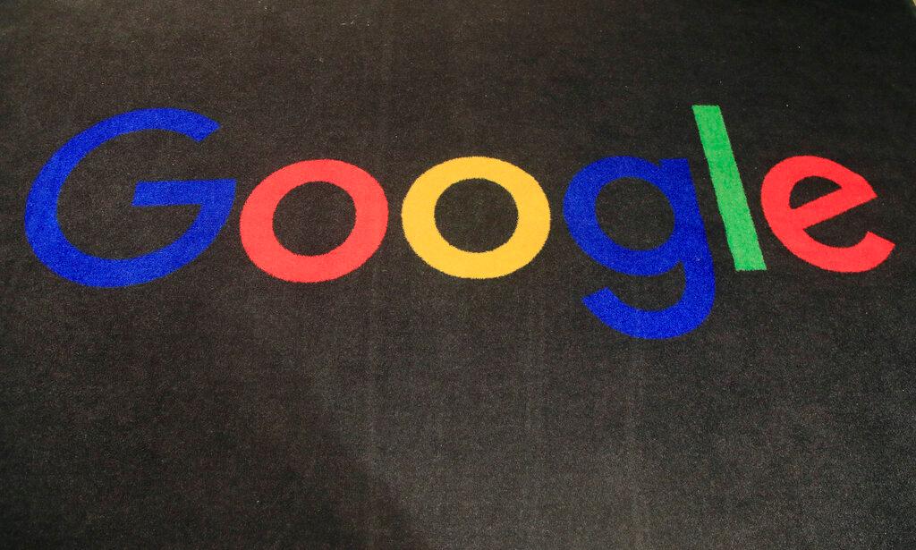 The logo of Google is displayed on a carpet at the entrance hall of Google France in Paris.