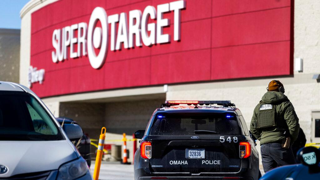 U.S. Marshal is pictured on the scene of a shooting at a Target store in Omaha, Neb.