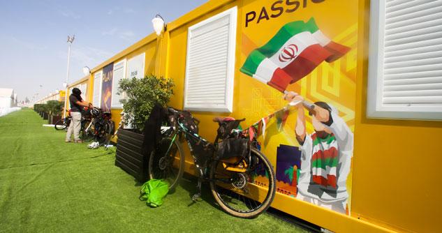 Yellow cabins with colorful World Cup pictures on the side