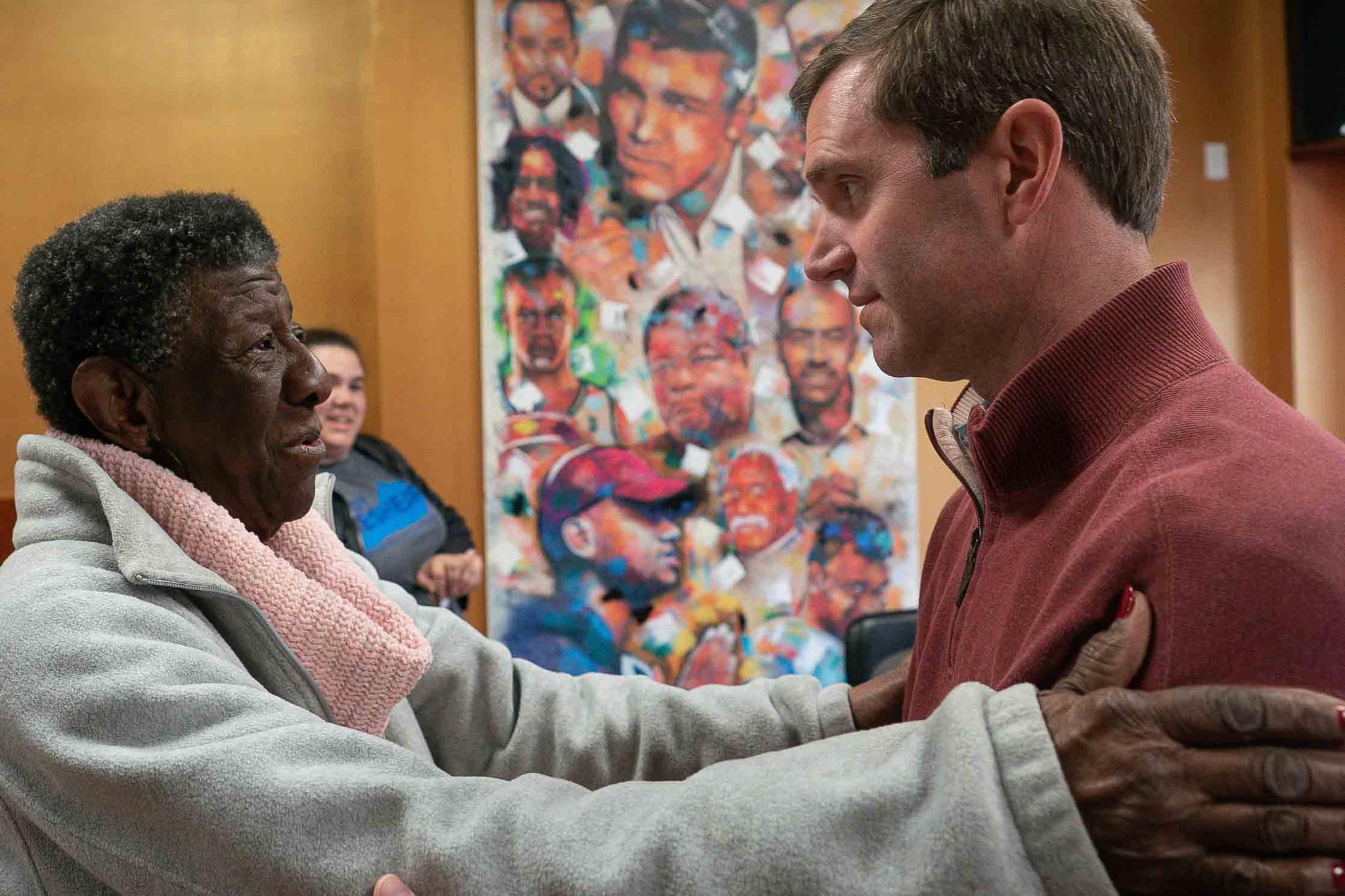 Kentucky Attorney General and Democratic gubernatorial candidate Andy Beshear speaks with Maddie Jones, of West Louisville