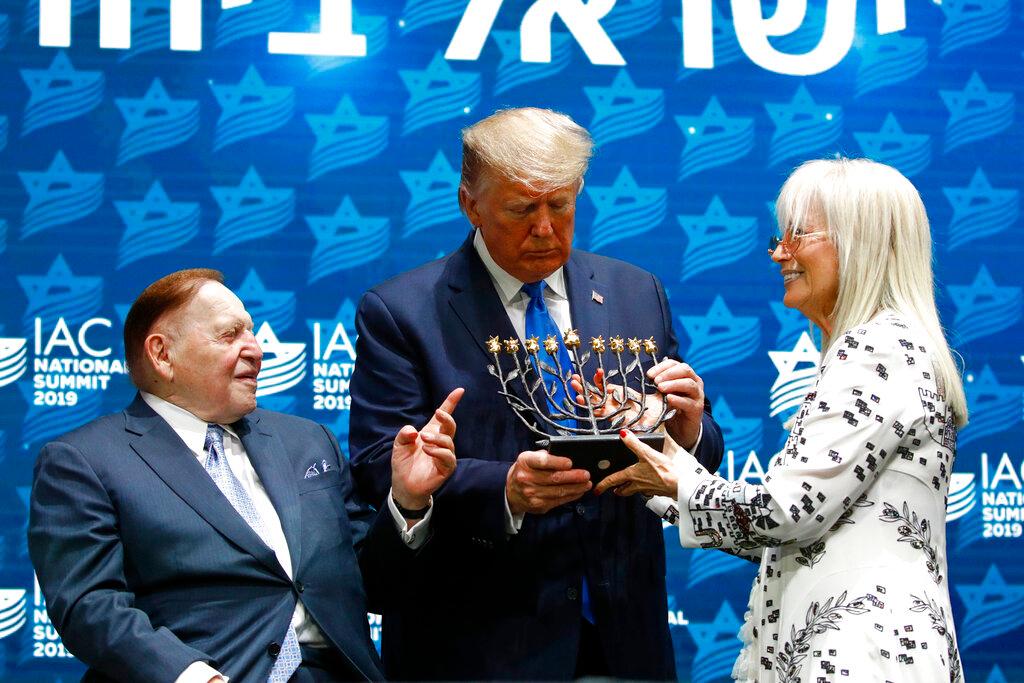 President Donald Trump receives a menorah