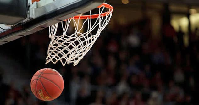 Basketball just made it through hoop to score